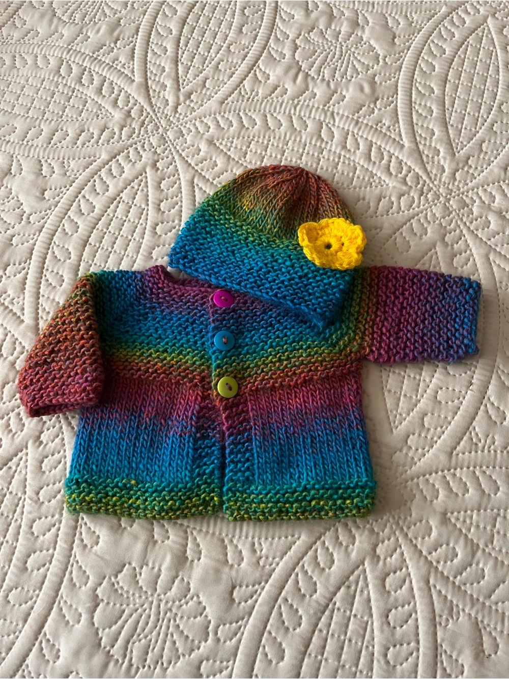 Handmade Rainbow Knit Baby Matching Set with Yellow Flower Accent